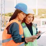 women operators doing daily equipment inspections