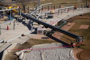 crane tipped over onto stadium construction site